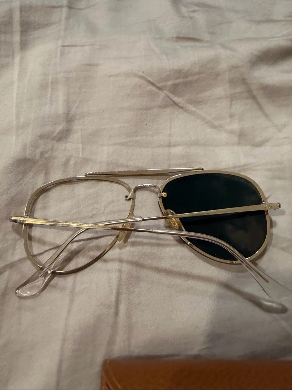 Ray-Ban Gold Frame Sunglasses with Black Lenses one lens needs fixing